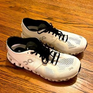On Cloud white athletic shoes